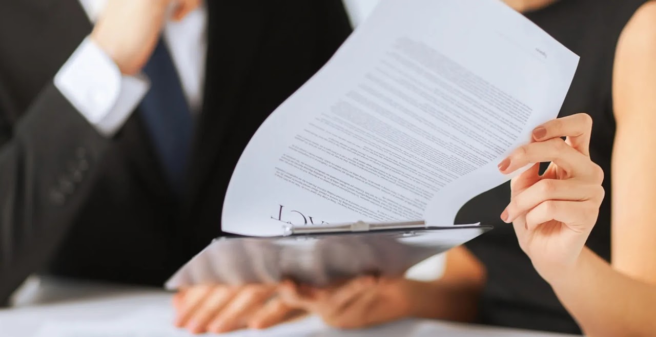 Business professionals reviewing documents